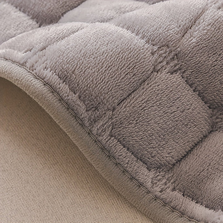 Elegant quiltet sofatrekk – komfort og beskyttelse