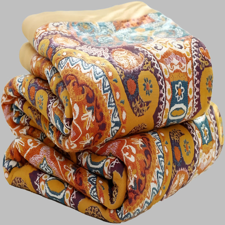 Soloppgang Boho Reversibel Pledd – Kunstnerisk Varme med Dobbelsidig Design