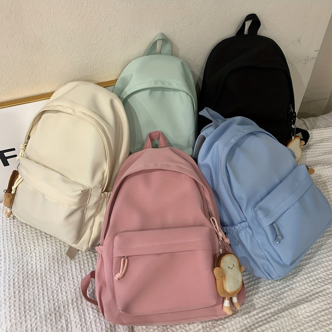 Lett skolsekk i nylon for damer i pastellfarger
