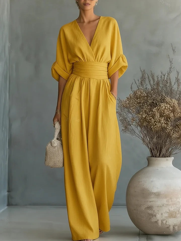 Elegant jumpsuit for damer med V-utringning og vide bukseben i høy midje
