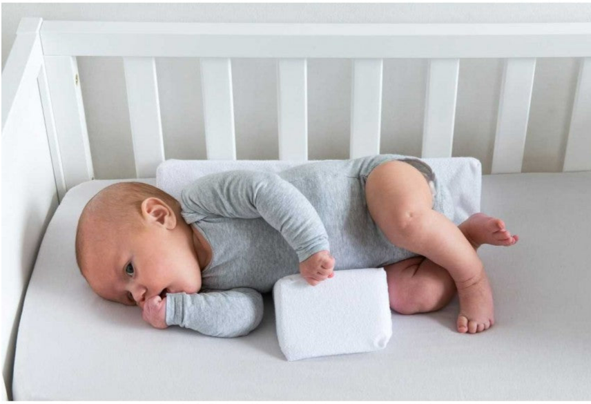 Justerbar antirullpute for babyer – Cudlo