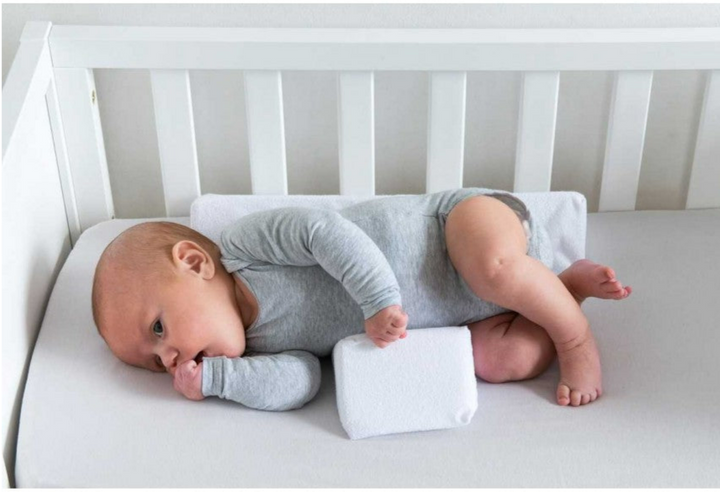 Justerbar antirullpute for babyer – Cudlo