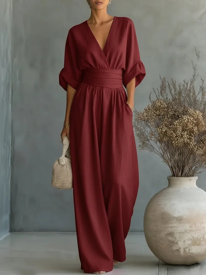 Elegant jumpsuit for damer med V-utringning og vide bukseben i høy midje