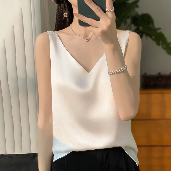 Stilig Silke Dame Top for en Elegant Utseende
