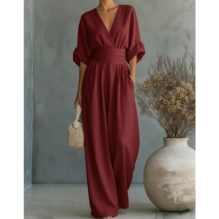Elegant jumpsuit for damer med V-utringning og vide bukseben i høy midje