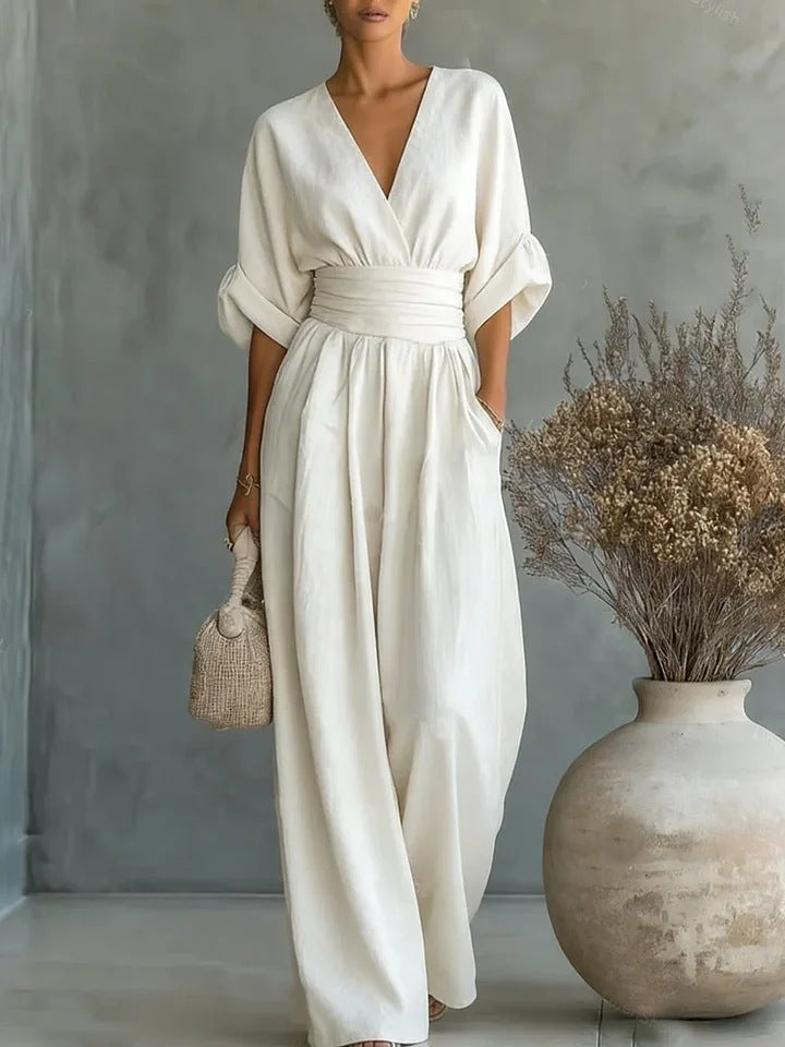 Elegant jumpsuit for damer med V-utringning og vide bukseben i høy midje