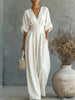 Elegant jumpsuit for damer med V-utringning og vide bukseben i høy midje