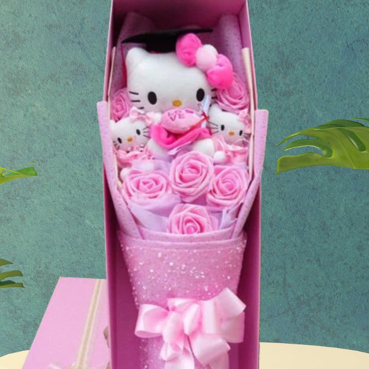 Bukett med fargerike kunstige blomster og Kitty-figurer til gave og pynt