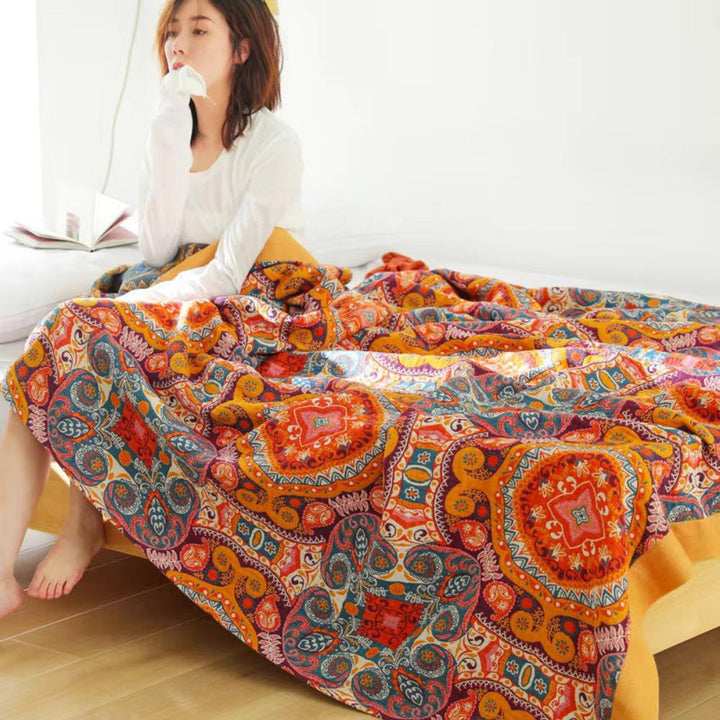 Soloppgang Boho Reversibel Pledd – Kunstnerisk Varme med Dobbelsidig Design