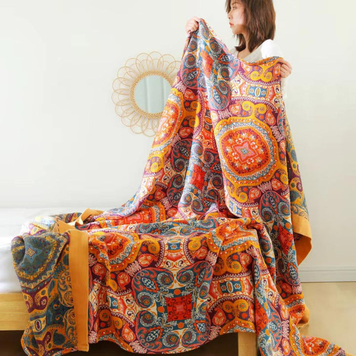 Soloppgang Boho Reversibel Pledd – Kunstnerisk Varme med Dobbelsidig Design