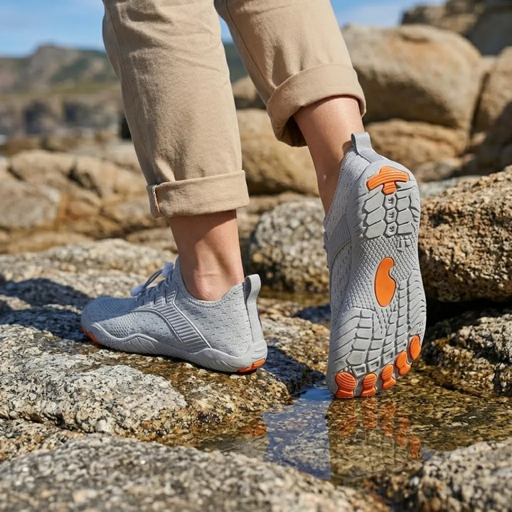Barfotsneakers til dame med bred tåboks og fleksibel såle