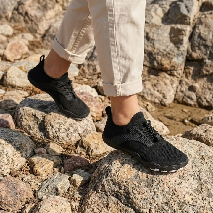 Barfotsneakers til dame med bred tåboks og fleksibel såle