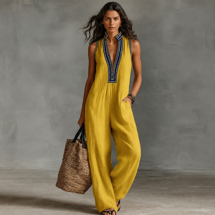 Kvinners ermeløs jumpsuit