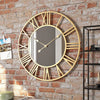 Stort vintage veggur i metall med speil, 39 cm