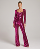 Paljettjumpsuit for dame med hjerteformet utringning, lange ermer og markert beltelinning