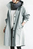 Oversized vanntett trenchcoat med hette