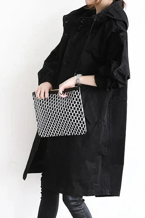 Oversized vanntett trenchcoat med hette