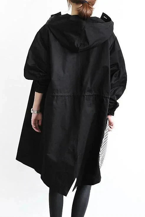 Oversized vanntett trenchcoat med hette