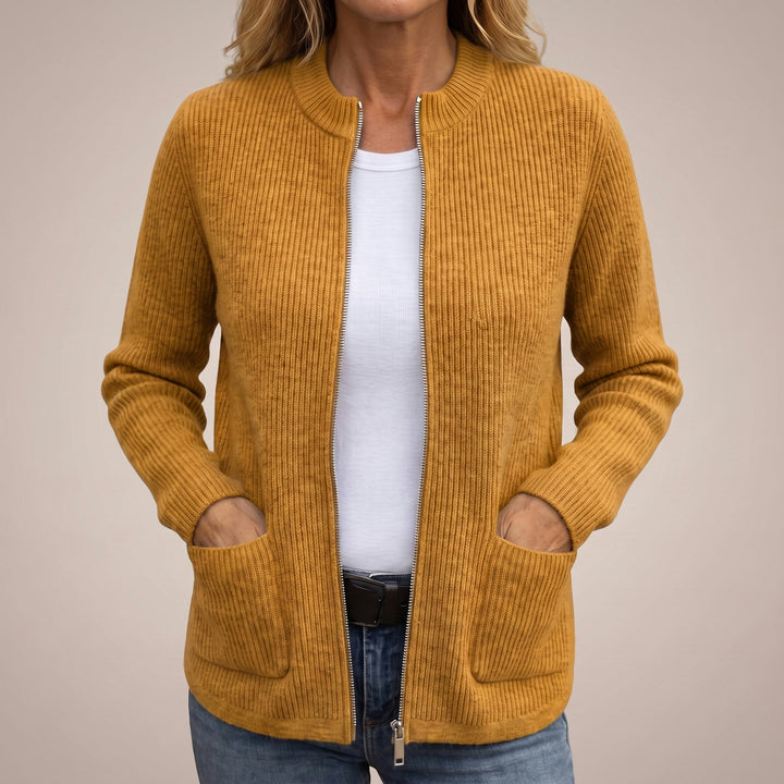 Myk cardigan med glidelås og dype frontlommer