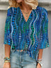 Abstrakt Polkadot Bluse med Flatterende V-Hals