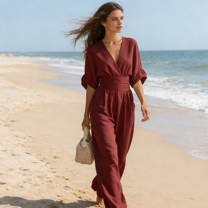 Elegant jumpsuit for damer med V-utringning og vide bukseben i høy midje