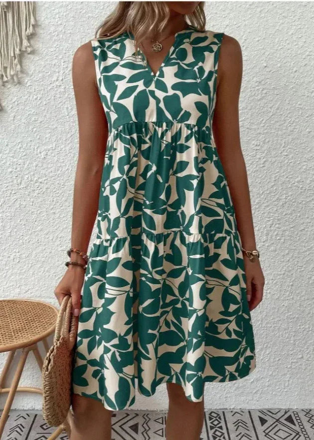 Elegant sommerkjole med V-hals og feminin silhuett