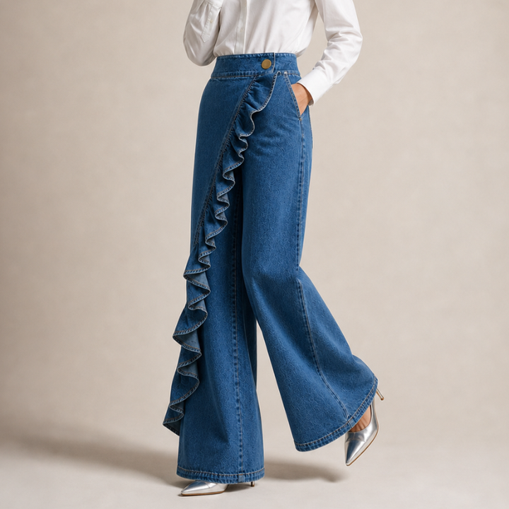 Vide dame-jeans med asymmetrisk volang i culotte-stil.