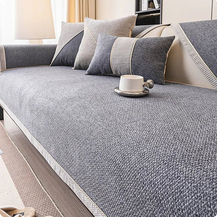 Universelt sofatrekk med sklisikker bakside som beskytter sofaen
