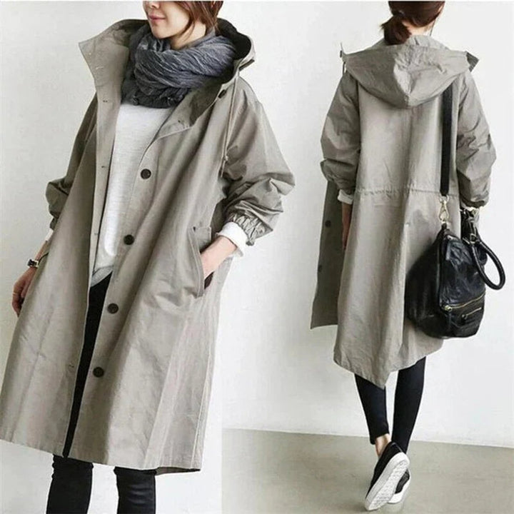 Lang trenchcoat for damer med hette, vanntett, oversized passform