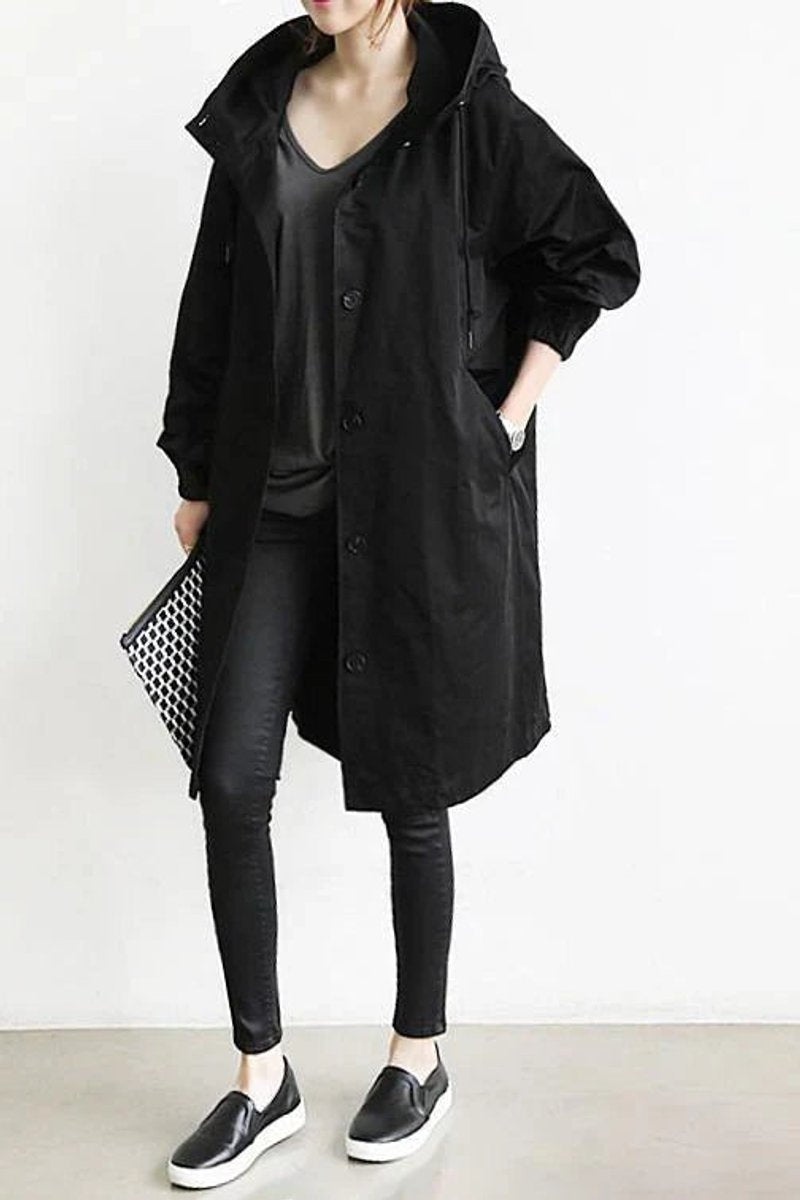 Lang trenchcoat for damer med hette, vanntett, oversized passform