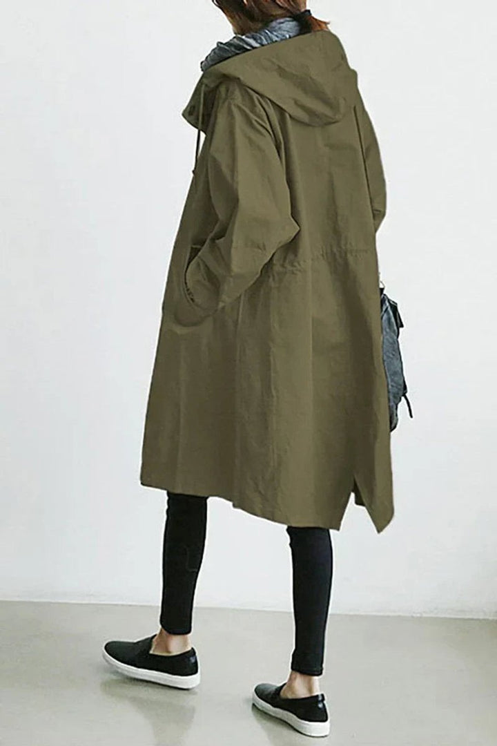 Lang trenchcoat for damer med hette, vanntett, oversized passform