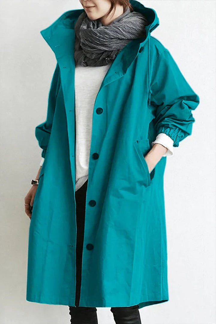Lang trenchcoat for damer med hette, vanntett, oversized passform